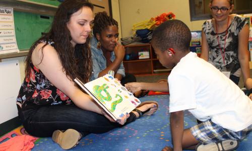 Child with Hearing Aid during Reading circle